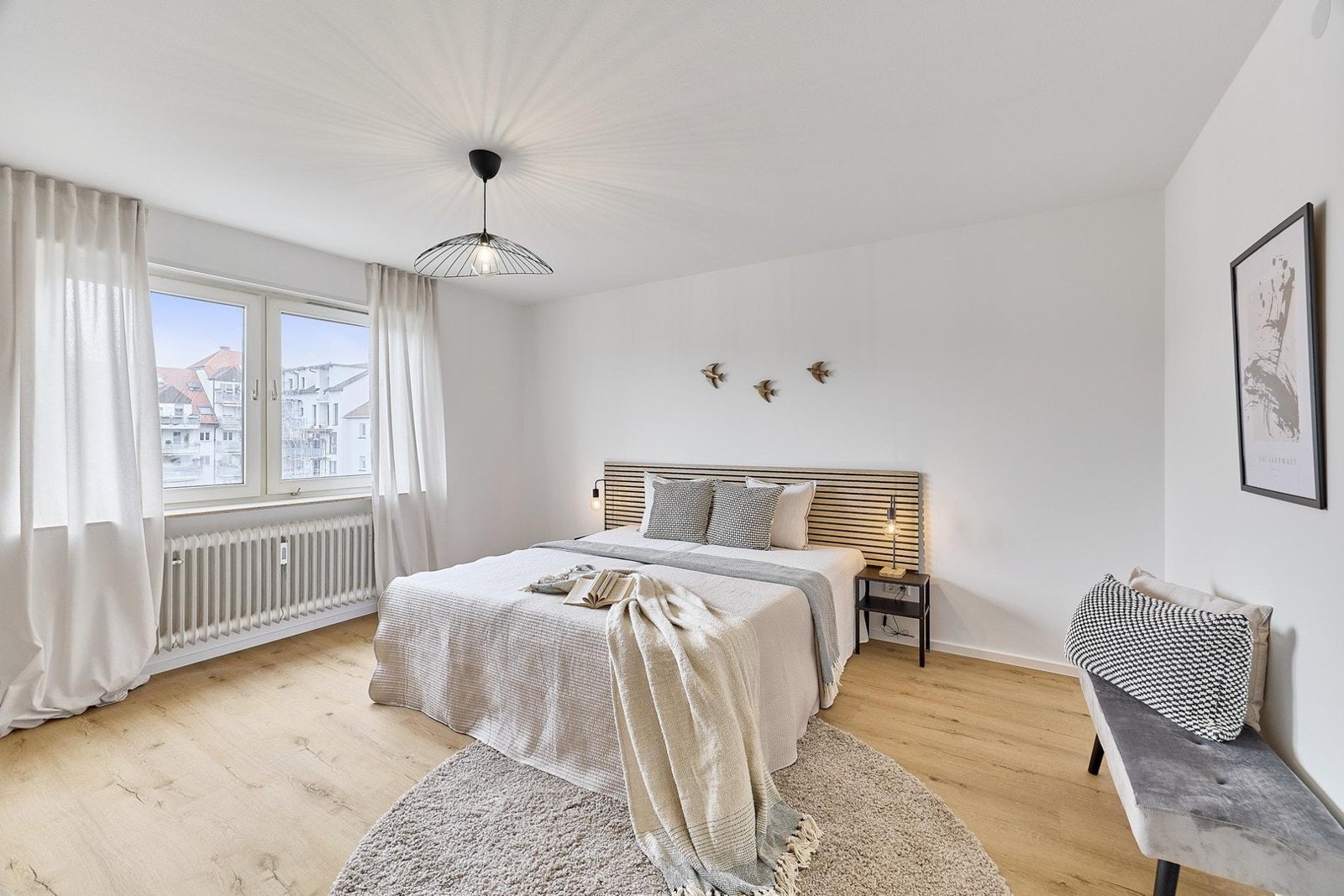 3-Zimmer-Wohnung mit zwei Balkonen, Mannheim-Rheinau — Schlafzimmer nach der Sanierung | Sanierung durch vivunt GmbH